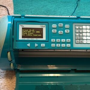 Cricut Expression 2 Provo Craft cutting machine in teal blue